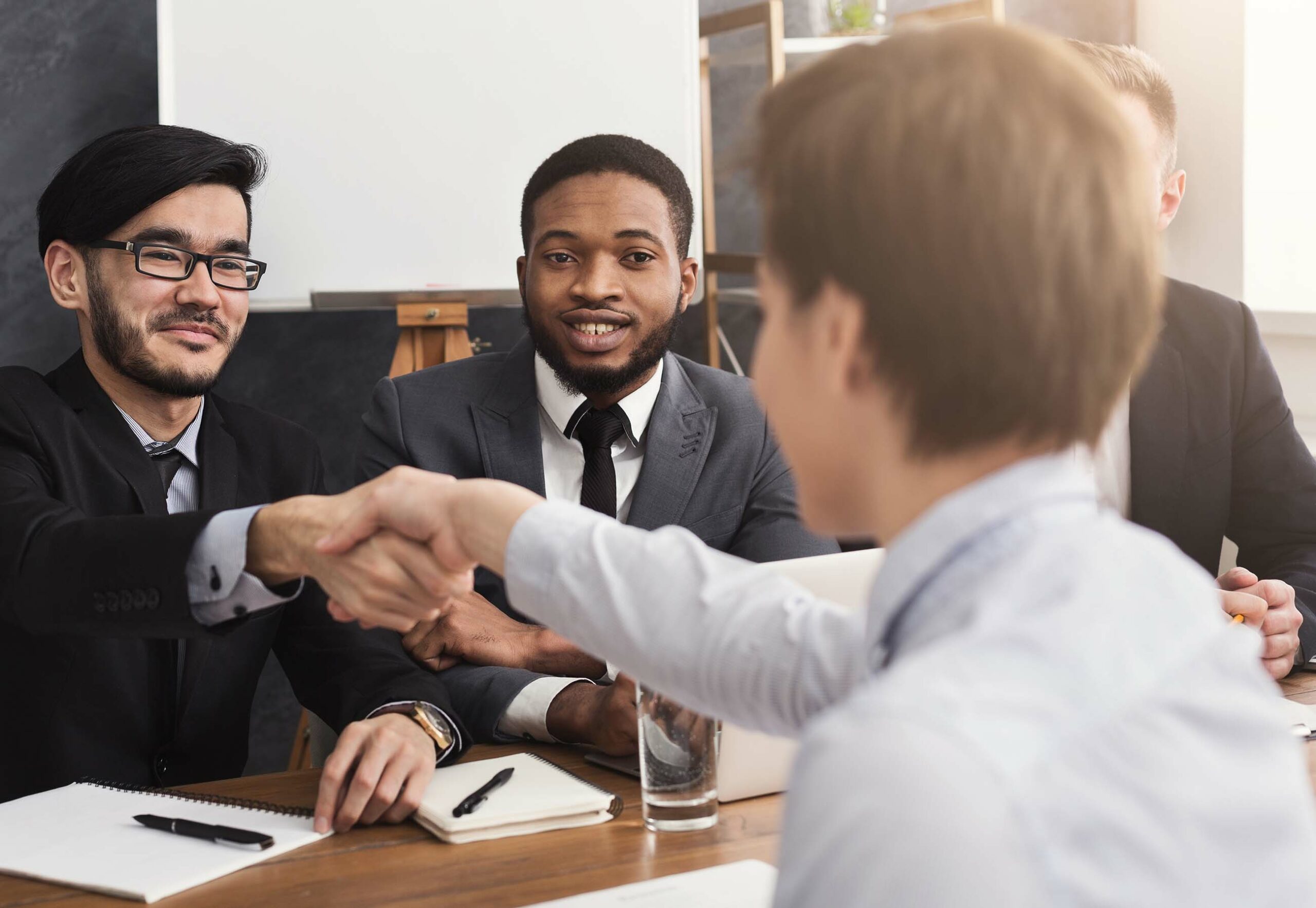 handshake-seal-deal-after-job-recruitment-meeting-smiling-businessman-shaking-hand-young-woman-he-want-hire-copy-space